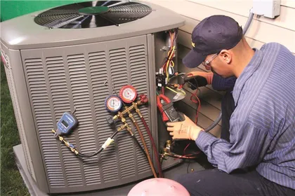 Technician Repairing AC Equipment